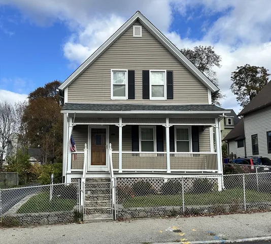 a front view of a house with a garage