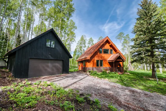 a front view of house with garden
