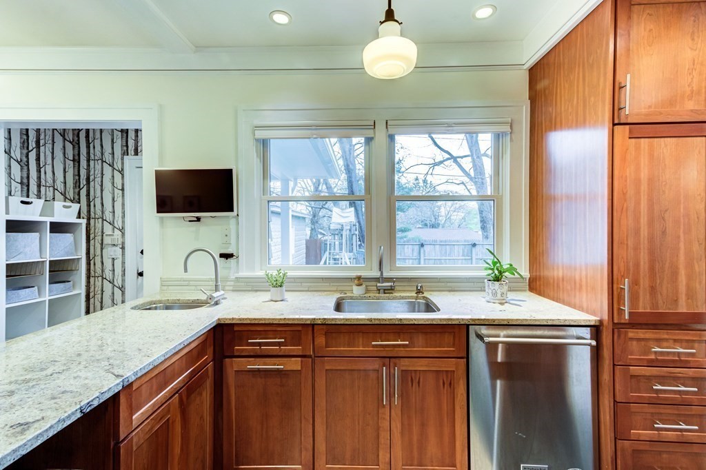 109 Morningside Road Worcester, MA 01602 - Photo 16 of 42 a kitchen with granite countertop a sink and a window