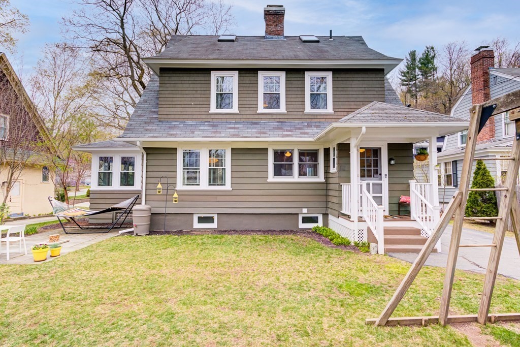 109 Morningside Road Worcester, MA 01602 - Photo 42 of 42 a front view of a house with a yard glass top table and chairs