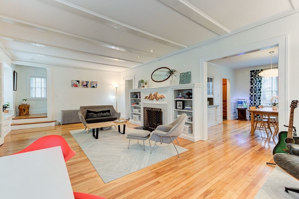 109 Morningside Road Worcester, MA 01602 - Photo 8 of 42 a living room with furniture a wooden floor and a fireplace