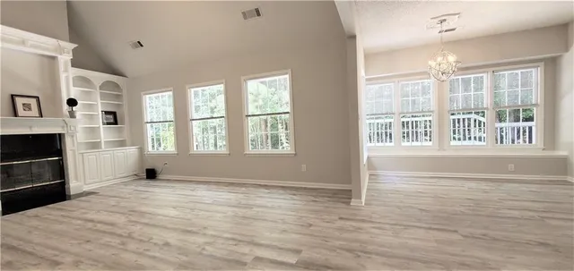 a view of livingroom with hardwood floor and window