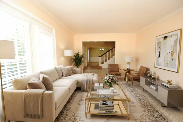 a living room with furniture and a couch