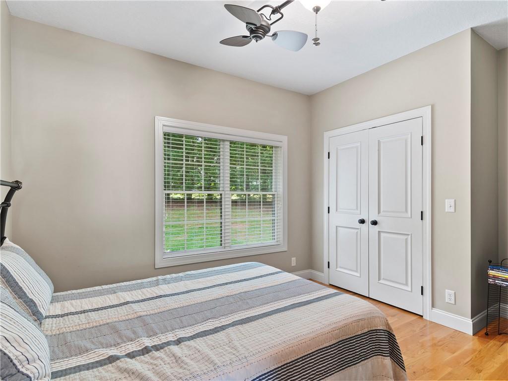 62 Vision Road Canton, NC 28716 - Photo 24 of 45 a bedroom with a bed and a window