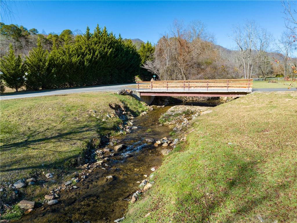 62 Vision Road Canton, NC 28716 - Photo 41 of 45 a view of a lake with a mountain in the background