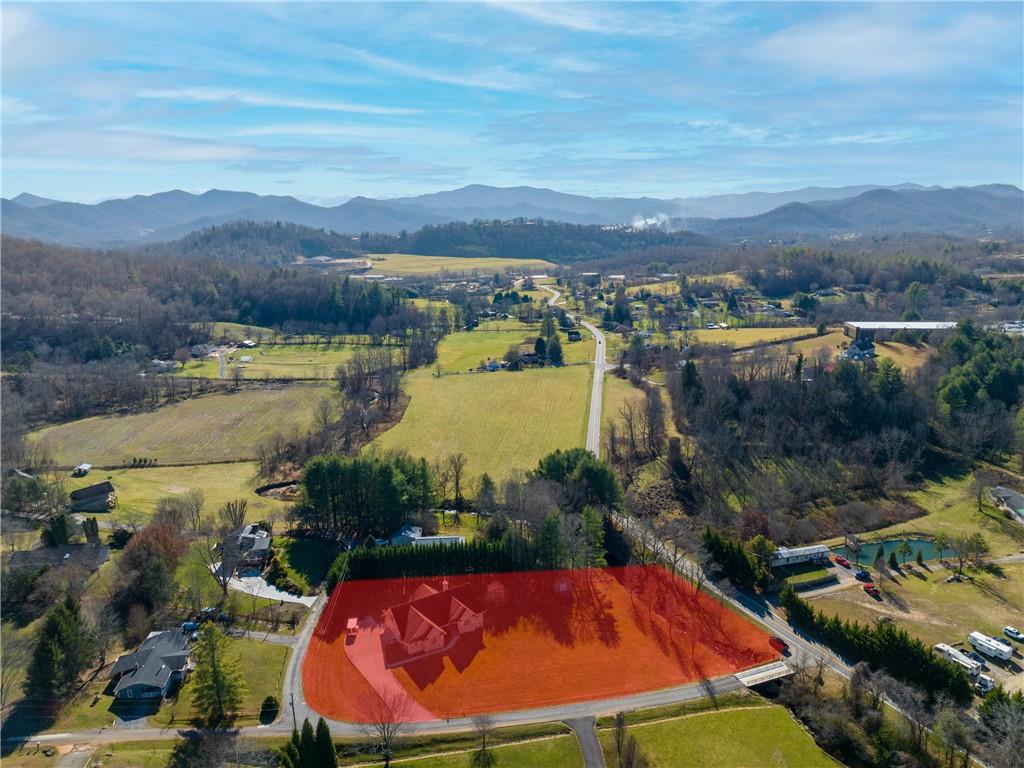 62 Vision Road Canton, NC 28716 - Photo 44 of 45 an aerial view of residential houses with outdoor space and lake view