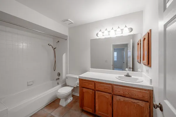 a bathroom with a toilet a sink and a bathtub
