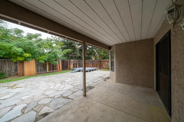 a house with trees in front of it