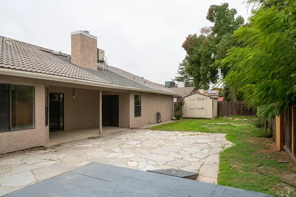 a house view with a garden space