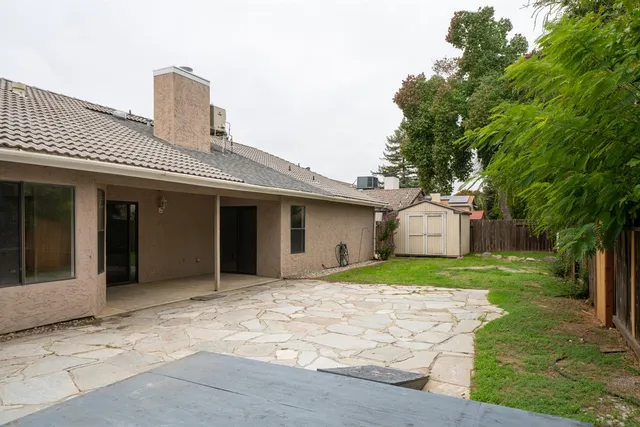 a house view with a garden space