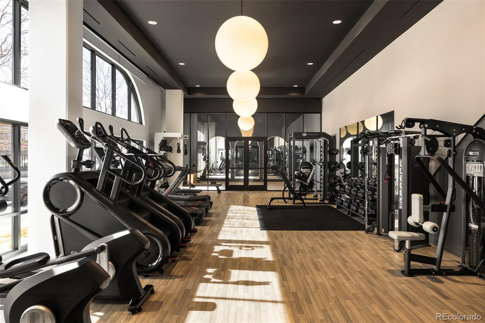 1521 Hooker Street, Unit 308 Denver, CO 80204 - Photo 14 of 31 a view of a room with gym equipment