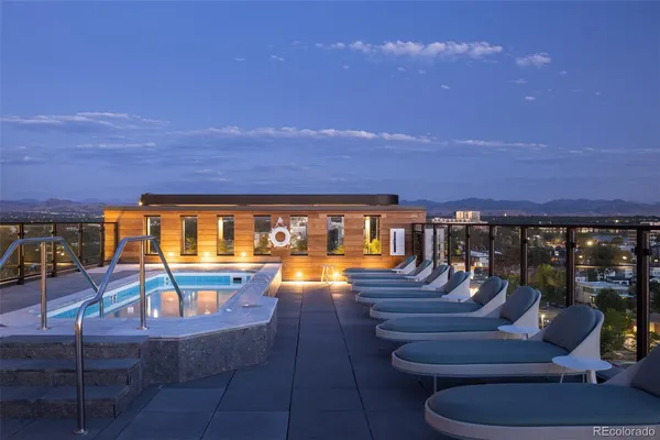 a view of a swimming pool with a patio
