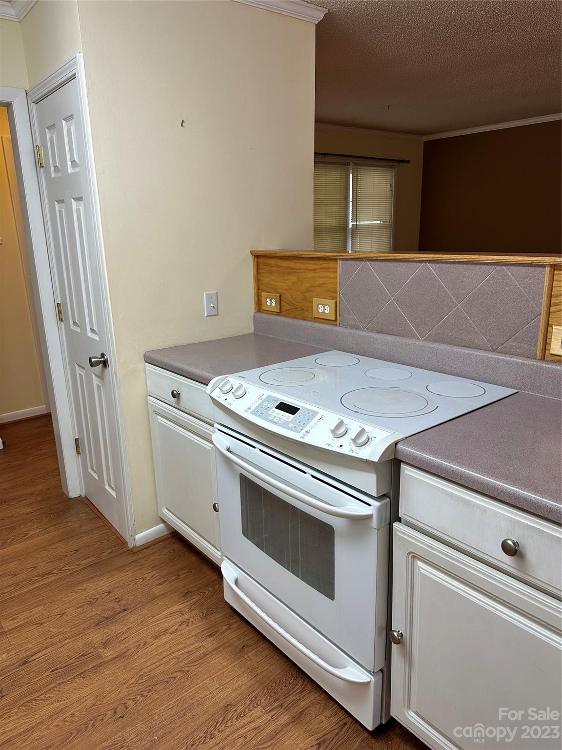 140 Hillside Drive Salisbury, NC 28147 - Photo 13 of 29 a view of washer and dryer with wooden floor