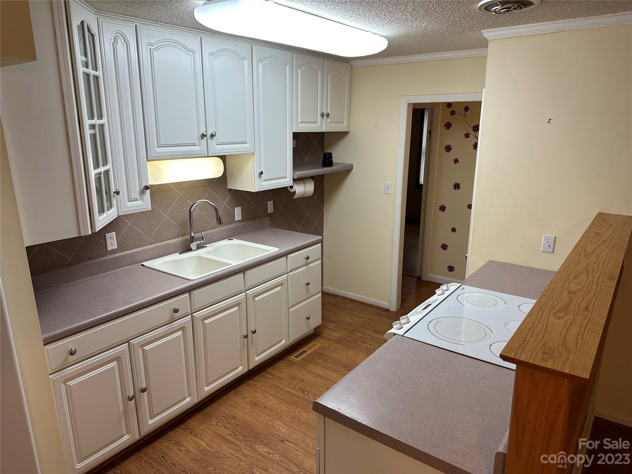 140 Hillside Drive Salisbury, NC 28147 - Photo 14 of 29 a kitchen with sink and cabinets