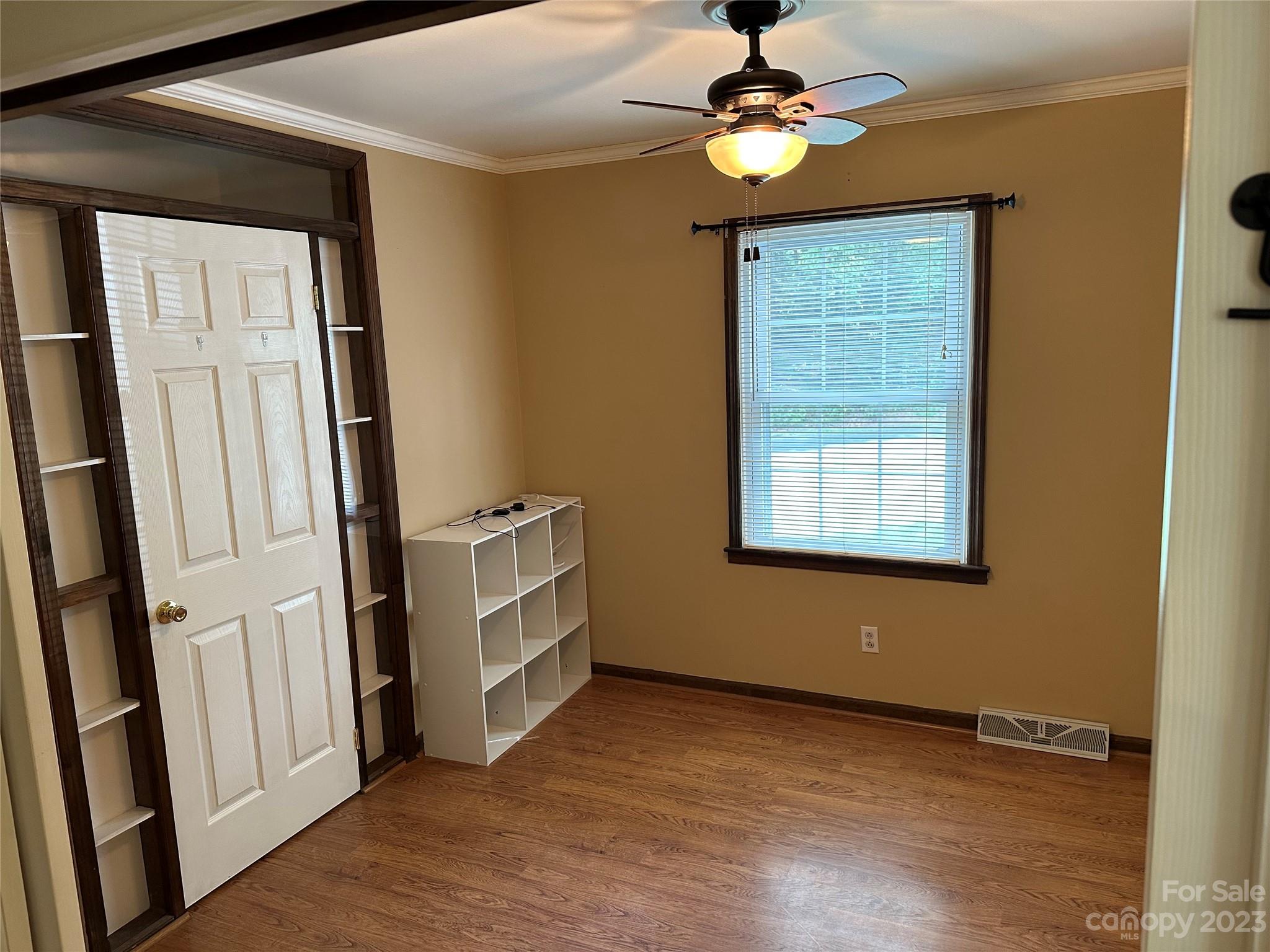 140 Hillside Drive Salisbury, NC 28147 - Photo 16 of 29 wooden floor in an empty room with a window