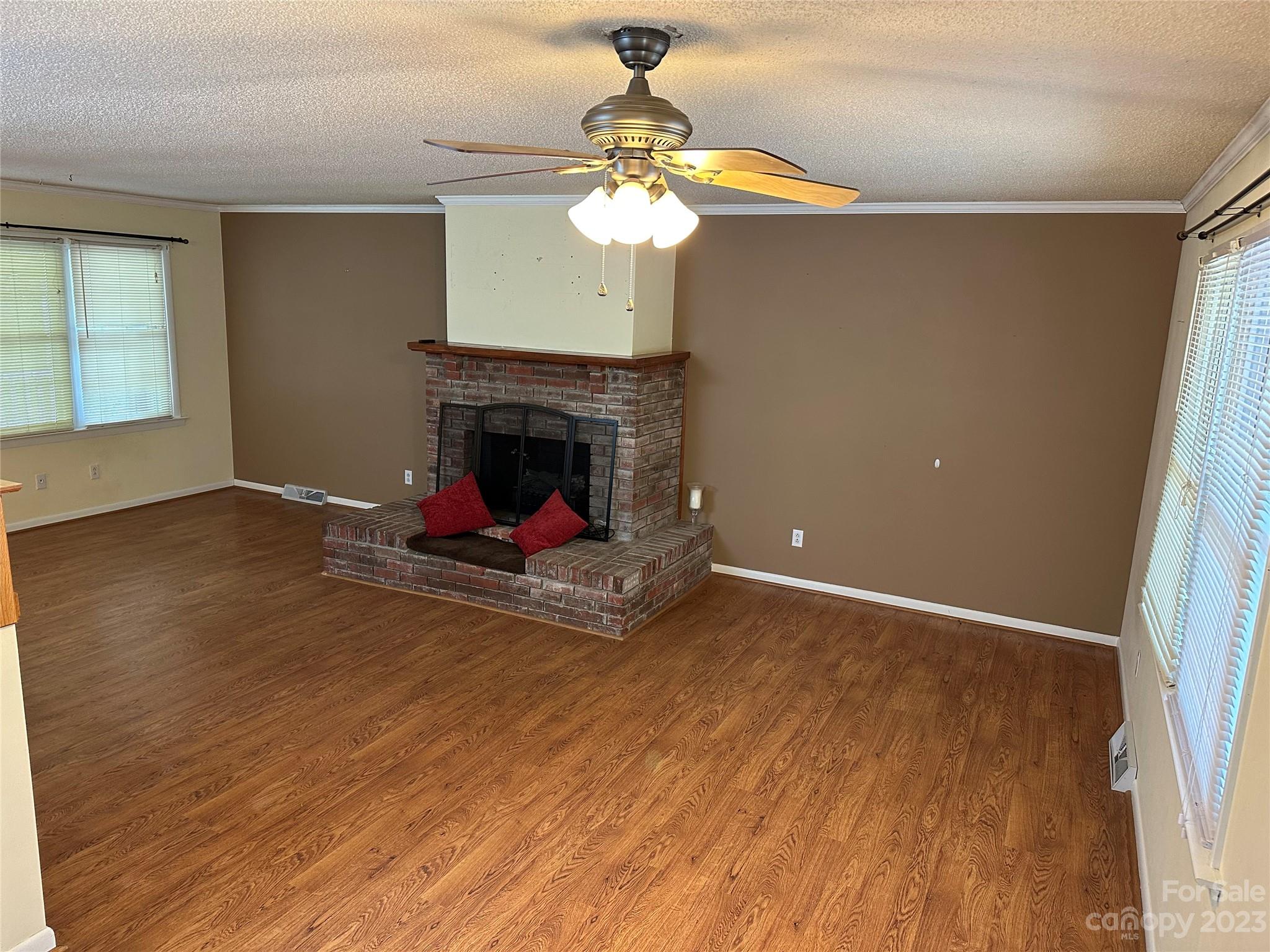 140 Hillside Drive Salisbury, NC 28147 - Photo 9 of 29 a living room with furniture and a fireplace