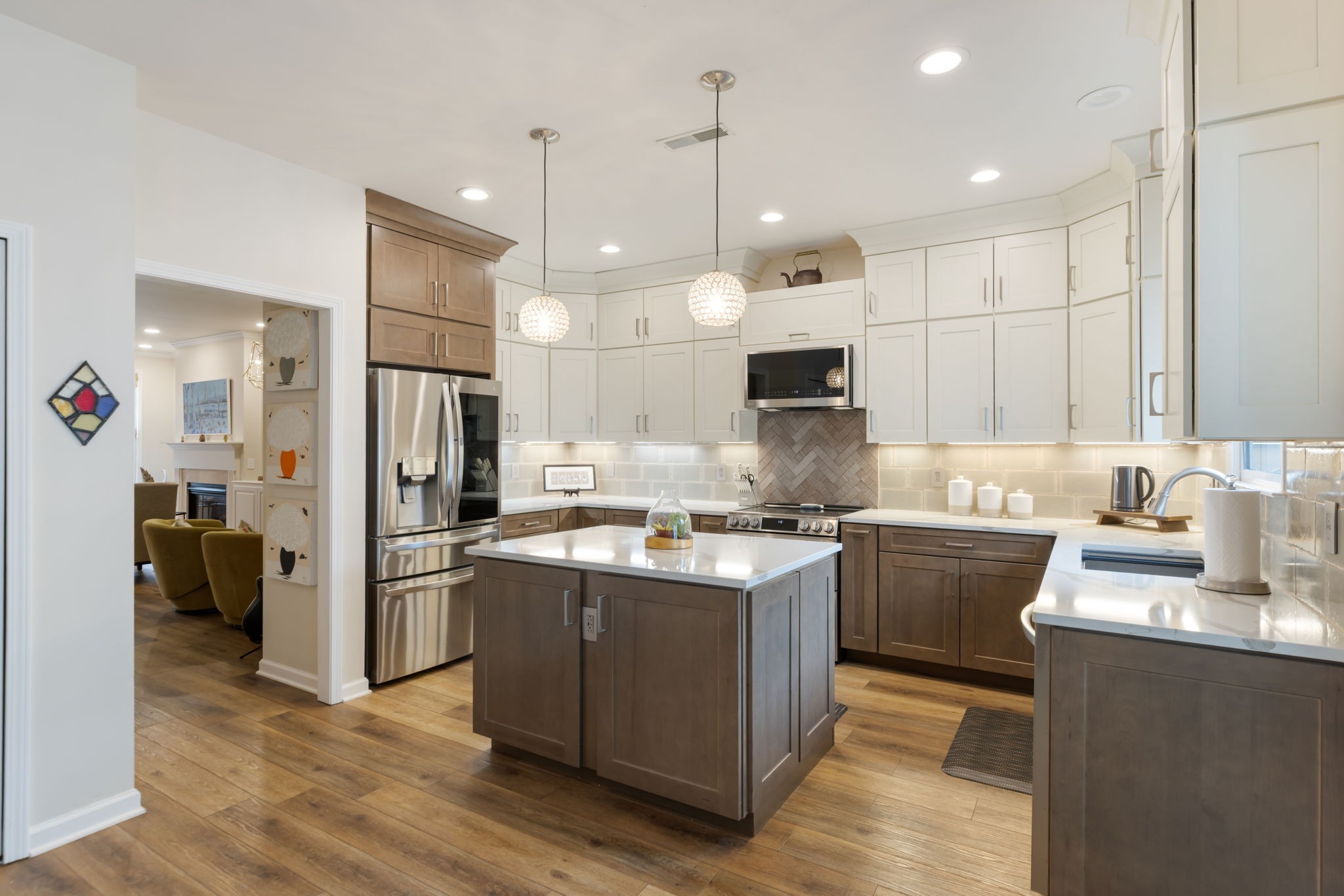 226 Pearl Street Franklin, TN 37064 - Photo 22 of 63 a kitchen with stainless steel appliances granite countertop a refrigerator a sink dishwasher a stove and white cabinets with wooden floor