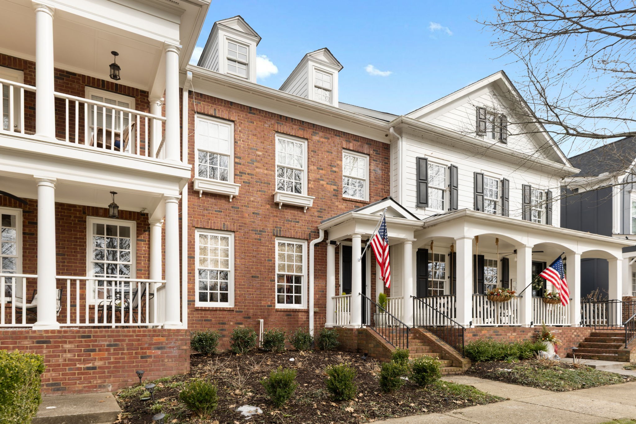 226 Pearl Street Franklin, TN 37064 - Photo 3 of 63 a front view of a residential apartment building with a yard