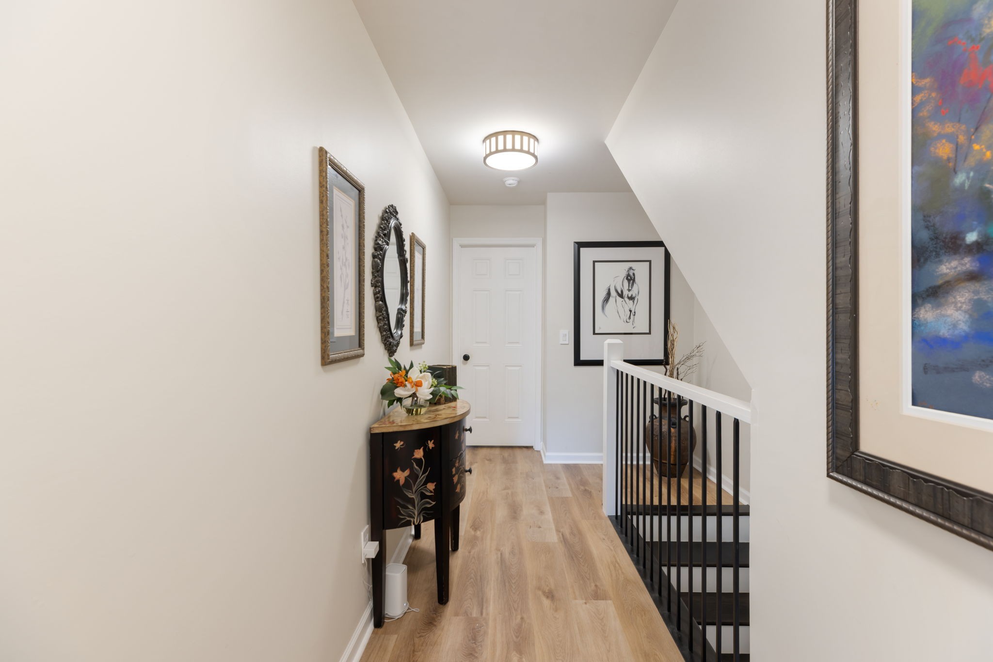 226 Pearl Street Franklin, TN 37064 - Photo 38 of 63 a view of a hallway with wooden floor and stairs