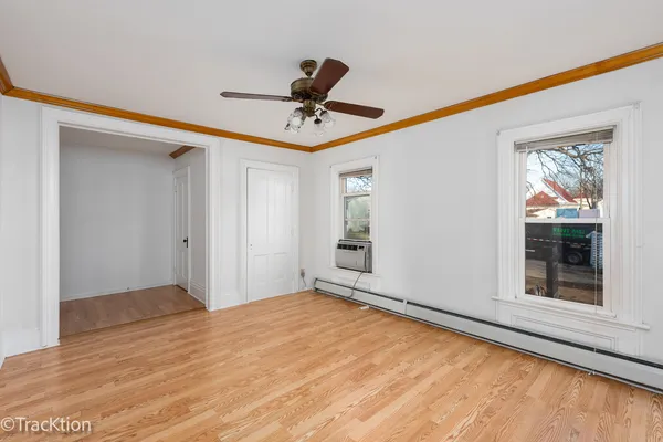 a view of an empty room with a window