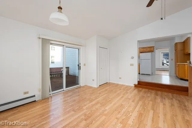 a bedroom with a bed and a view of bathroom