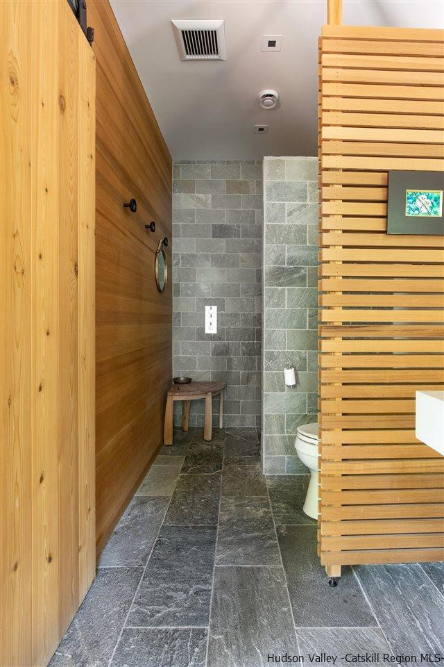 60 Ridgewood Road Kerhonkson, NY 12446 - Photo 14 of 31 a bathroom with a toilet and a shower