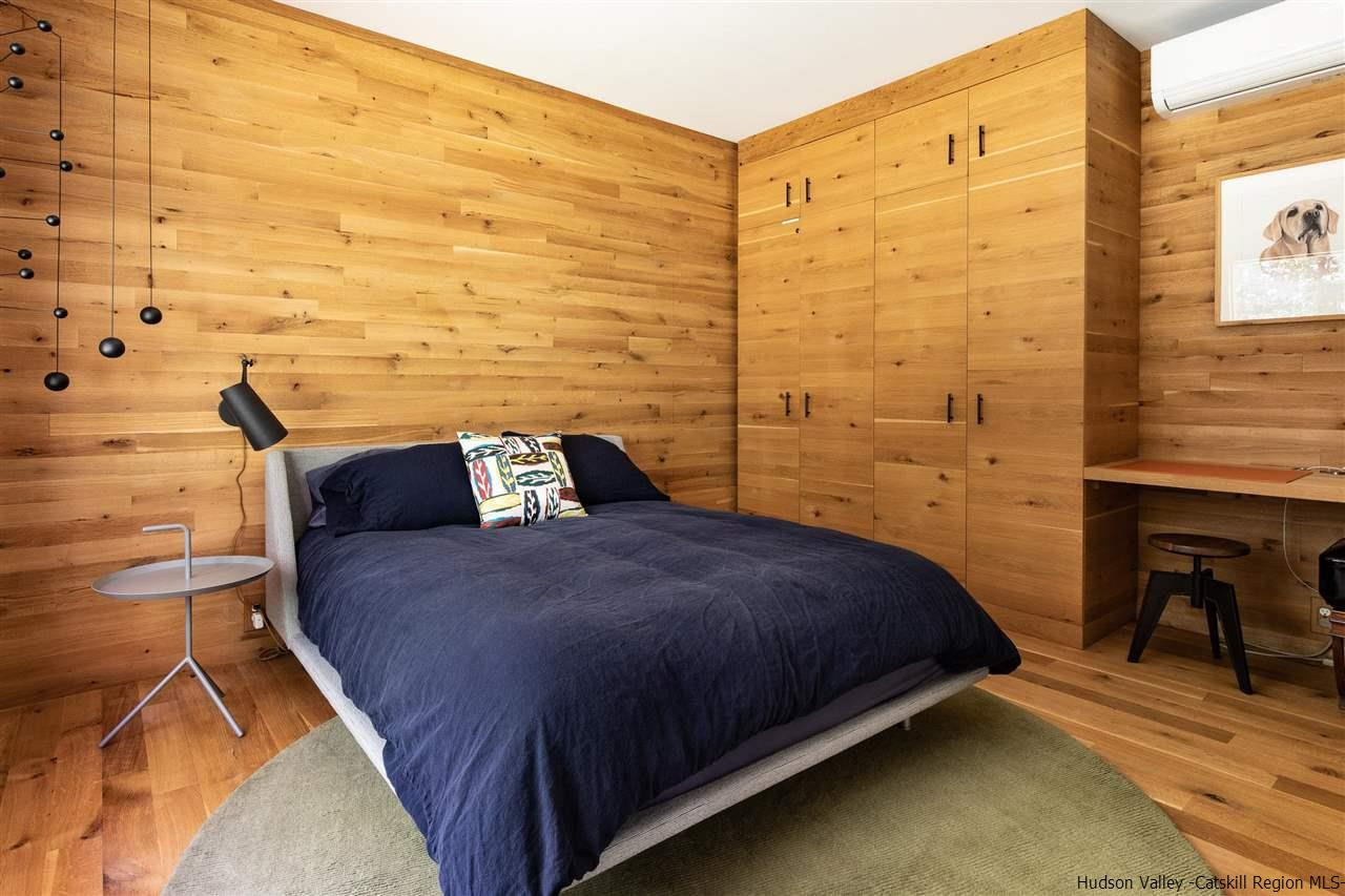 60 Ridgewood Road Kerhonkson, NY 12446 - Photo 18 of 31 a bedroom with a bed and a desk