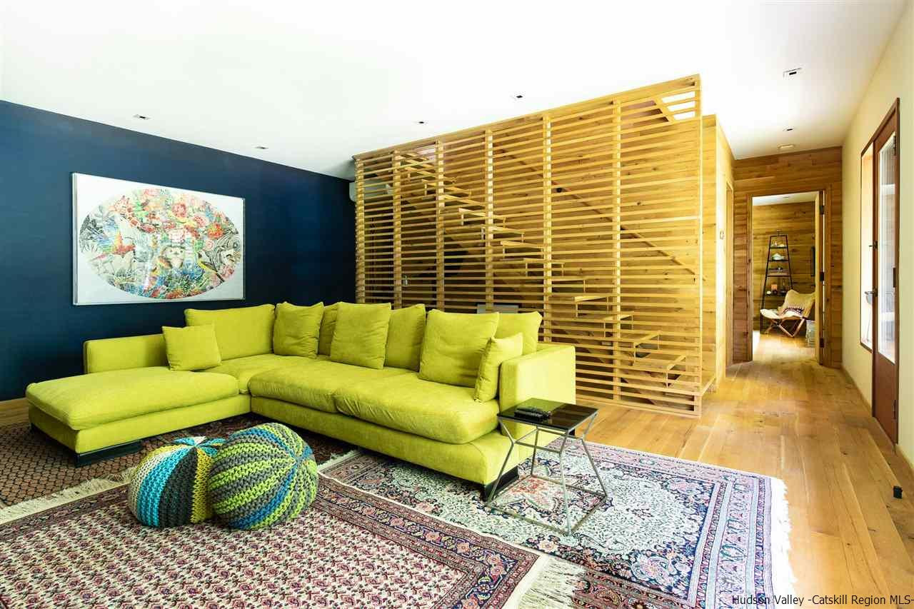 60 Ridgewood Road Kerhonkson, NY 12446 - Photo 20 of 31 a living room with furniture and a flat screen tv