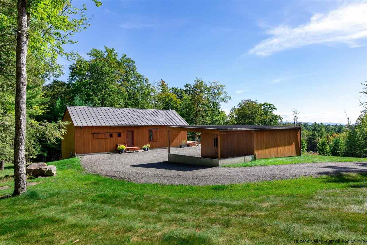 60 Ridgewood Road Kerhonkson, NY 12446 - Photo 2 of 31 a front view of a house with garden