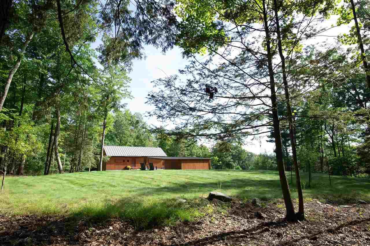60 Ridgewood Road Kerhonkson, NY 12446 - Photo 28 of 31 a view of a backyard with large trees