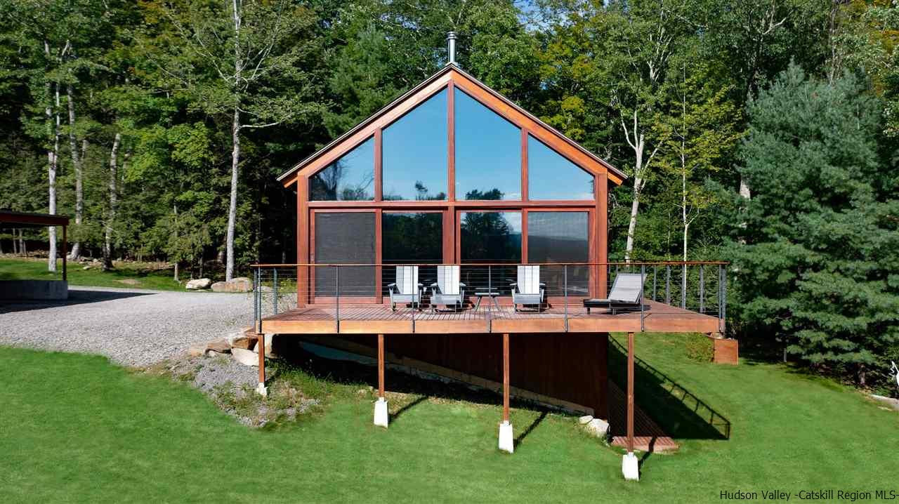 60 Ridgewood Road Kerhonkson, NY 12446 - Photo 4 of 31 a front view of house with yard barbeque and outdoor seating