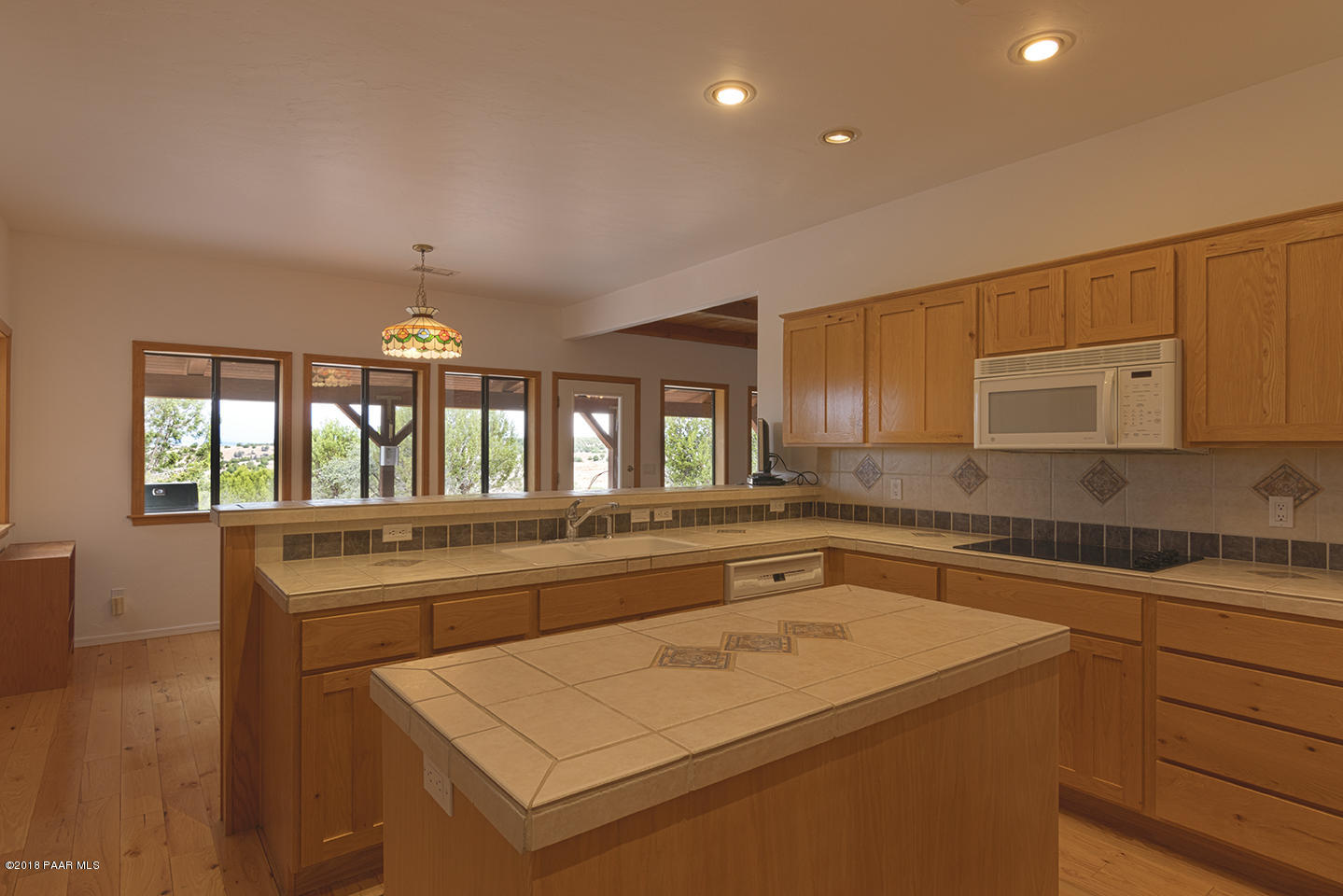 7600 Dillon Wash Road Prescott, AZ 86305 - Photo 11 of 35 a kitchen that has a sink and a stove