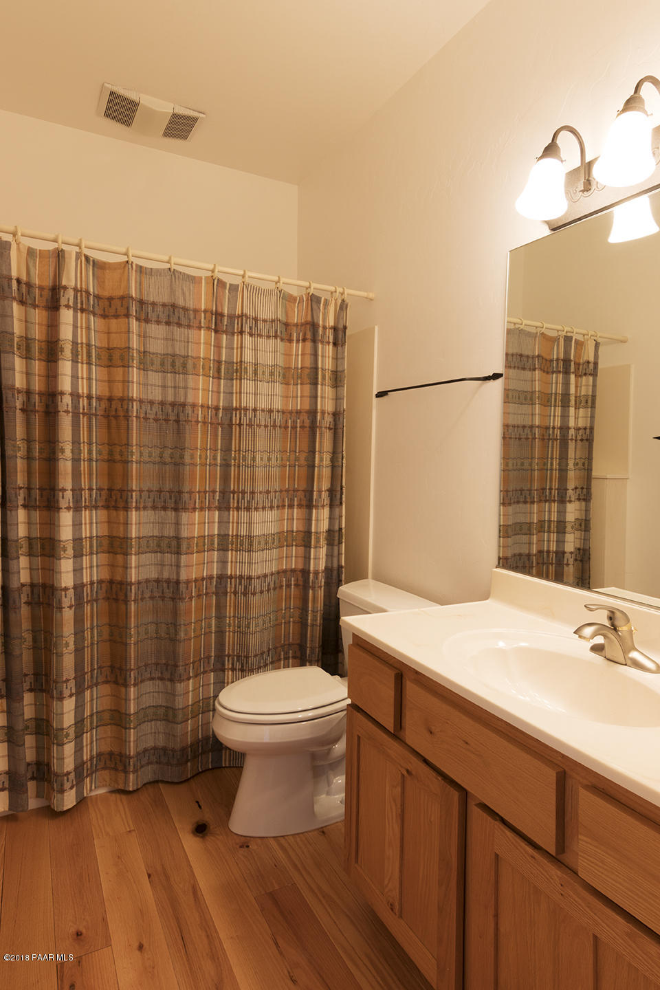 7600 Dillon Wash Road Prescott, AZ 86305 - Photo 19 of 35 a bathroom with a sink a toilet and shower