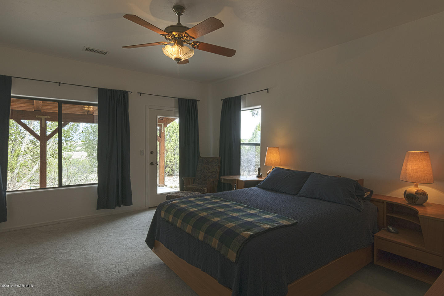 7600 Dillon Wash Road Prescott, AZ 86305 - Photo 20 of 35 a bedroom with a bed and a window