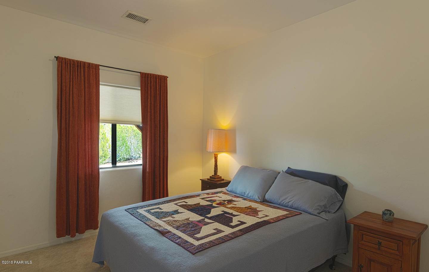 7600 Dillon Wash Road Prescott, AZ 86305 - Photo 22 of 35 a living room with a bed and a window