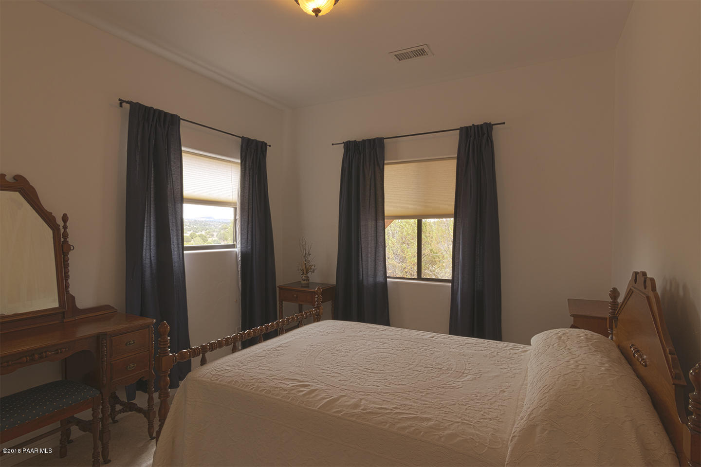 7600 Dillon Wash Road Prescott, AZ 86305 - Photo 23 of 35 a bedroom with a bed and a window