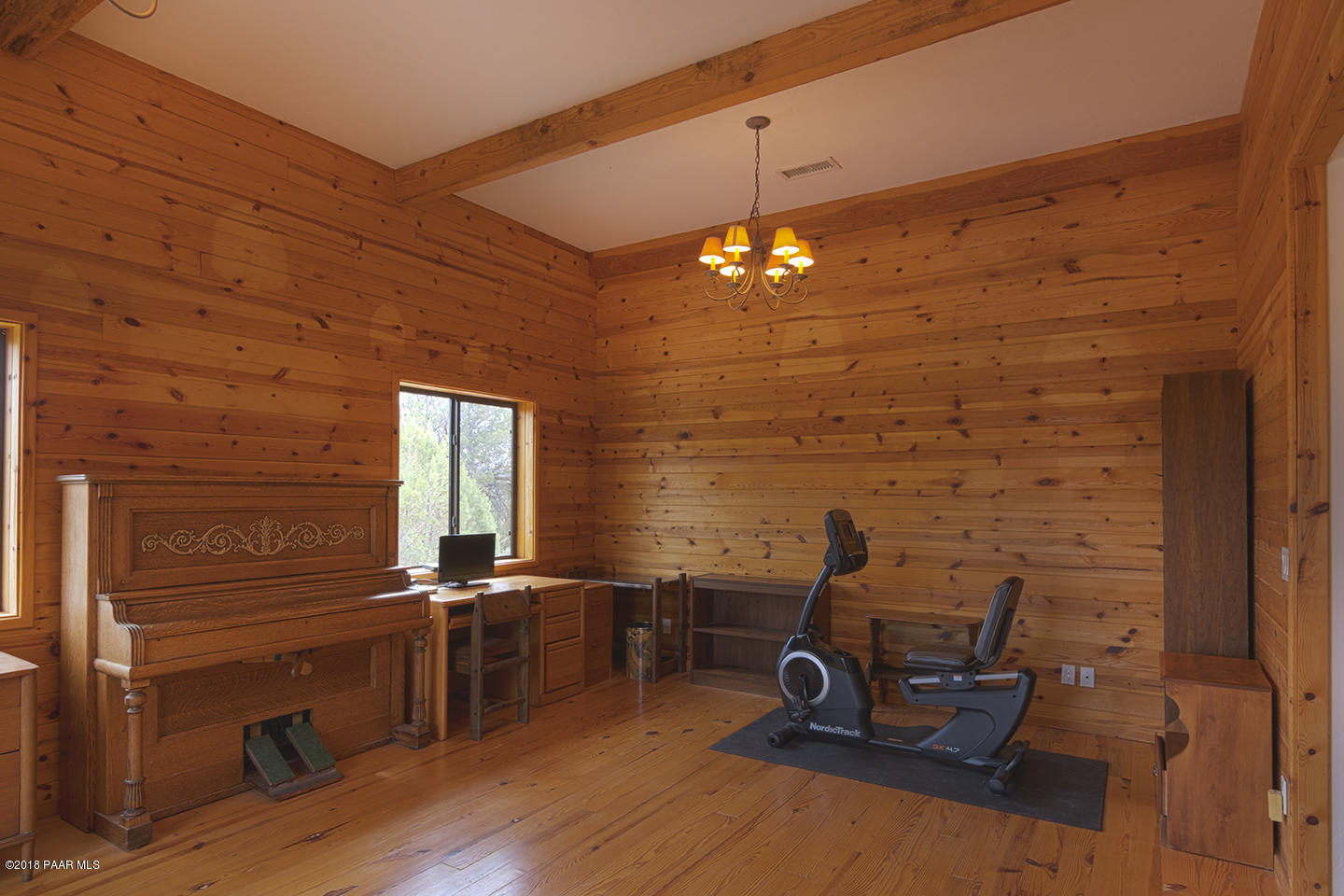 7600 Dillon Wash Road Prescott, AZ 86305 - Photo 25 of 35 a view of a workspace with furniture and chandelier
