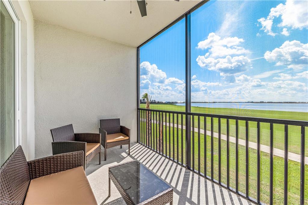 a view of a balcony with furniture