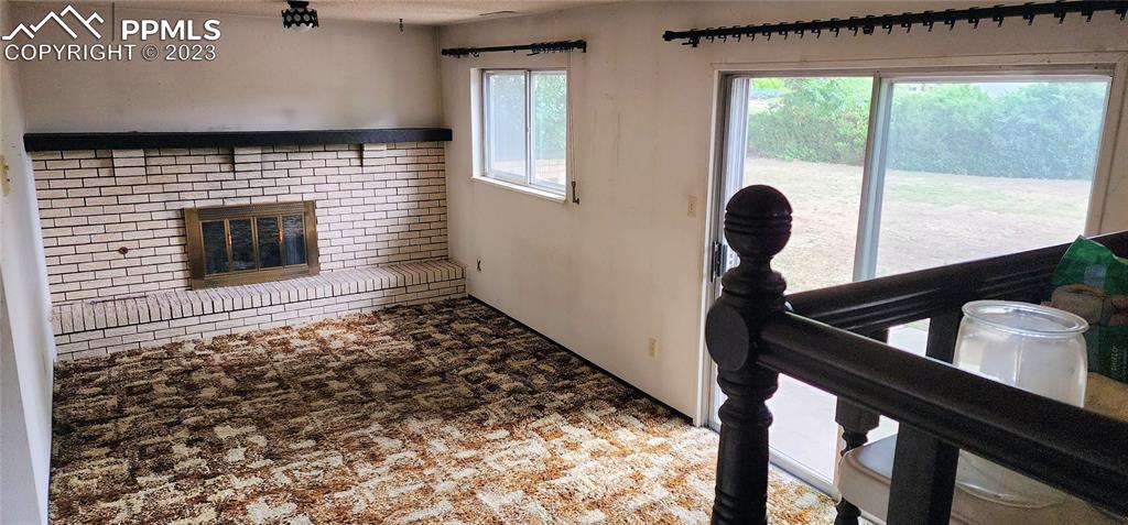 1404 Imperial Road Colorado Springs, CO 80918 - Photo 18 of 26 a front view of a house with stairs