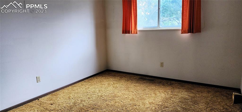 1404 Imperial Road Colorado Springs, CO 80918 - Photo 23 of 26 a view of a room that has a window in it