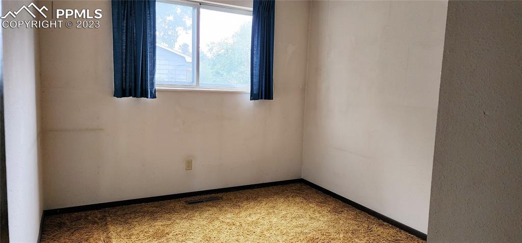 1404 Imperial Road Colorado Springs, CO 80918 - Photo 24 of 26 a view of a room with window