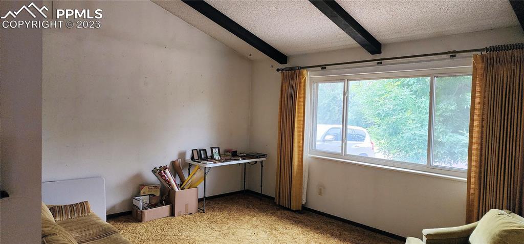 1404 Imperial Road Colorado Springs, CO 80918 - Photo 4 of 26 a view of a room with window and workspace