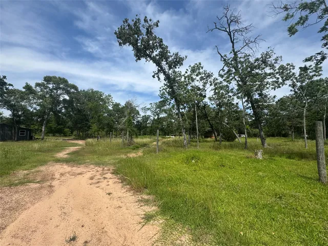 a view of a lake view with a big yard