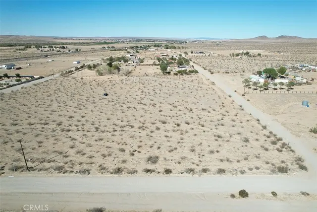 an aerial view of beach and ocean