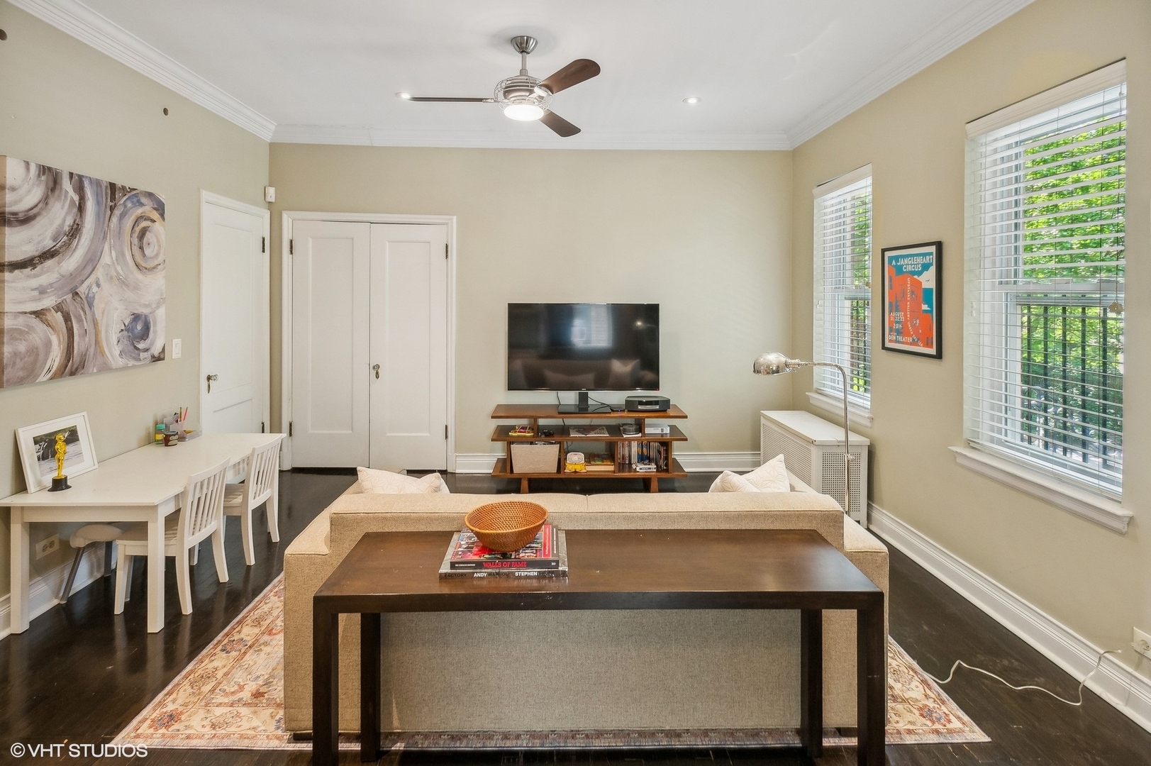 655 West Junior Terrace, Unit 1 Chicago, IL 60613 - Photo 13 of 24 a living room with furniture and a flat screen tv