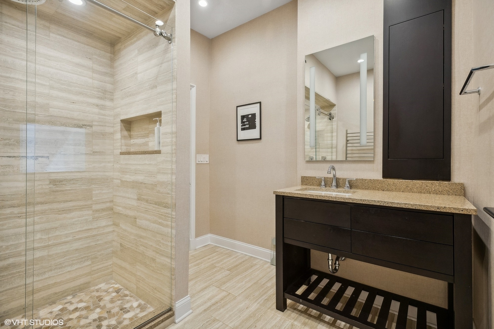 655 West Junior Terrace, Unit 1 Chicago, IL 60613 - Photo 20 of 24 a bathroom with a sink a mirror and a toilet