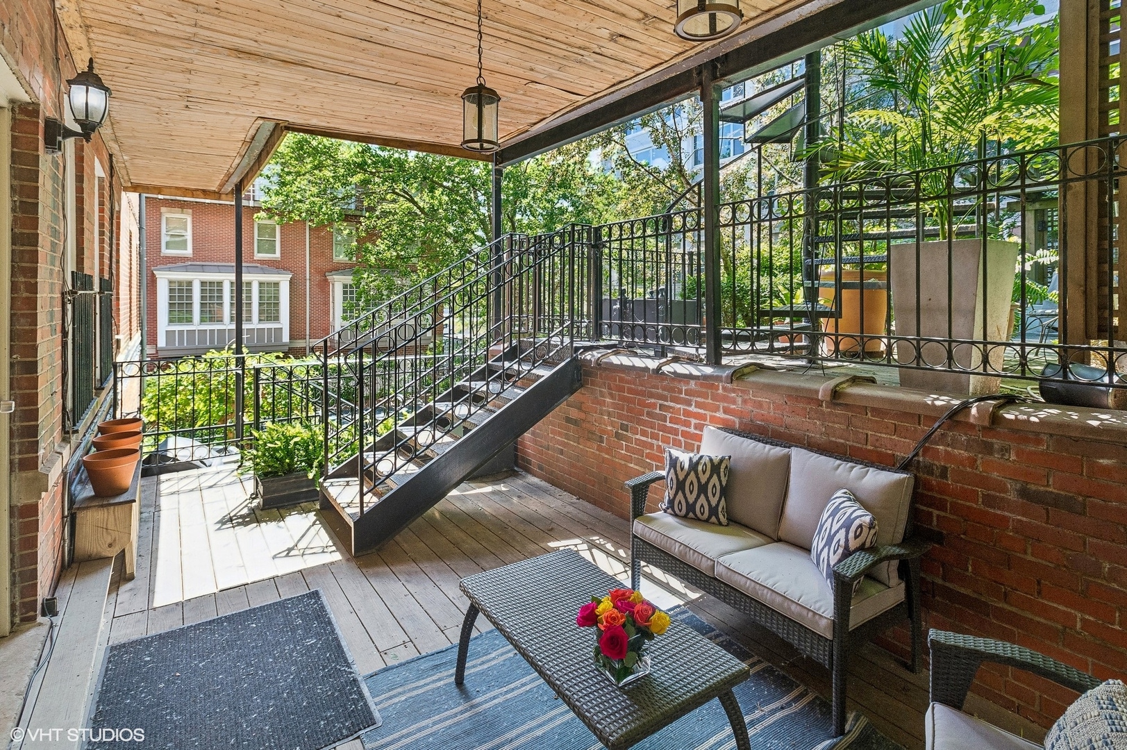 655 West Junior Terrace, Unit 1 Chicago, IL 60613 - Photo 22 of 24 a outdoor living space with furniture and garden view