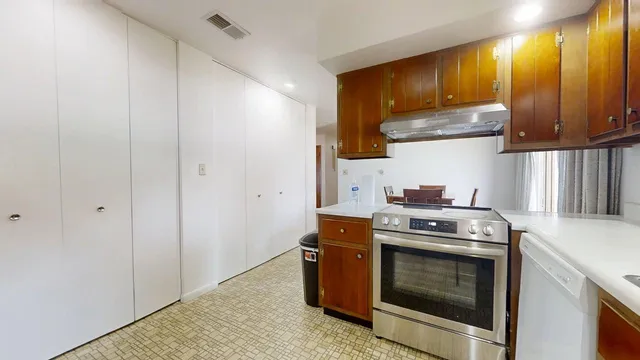 a kitchen with a stove and a microwave