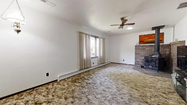 a view of a livingroom with a fireplace