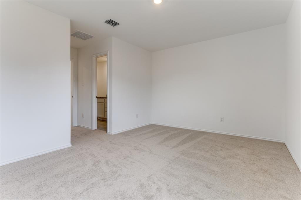 127 Sunflower Street Princeton, TX 75407 - Photo 15 of 21 Empty room featuring light colored carpet